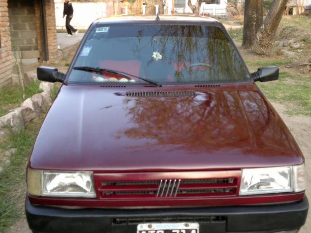 Vendo fiat uno modelo 95 scr full nafta/gnc con check panel. bordó.