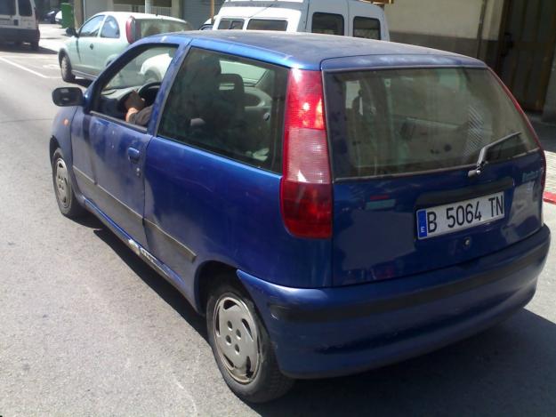 cambio fiat punto1.1i  del año 96  por moto min 125cc