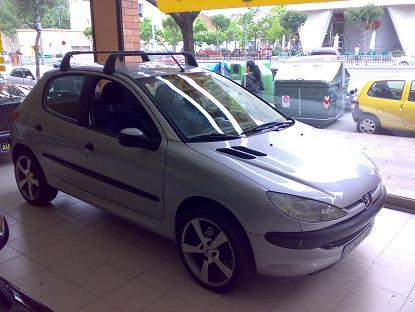 peugeot 206 1.9 diesel 5 puertas perfecto estado llantas 17 pul.  todos los extras las reb