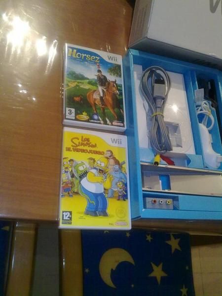 nintendo wii con 5 juegos sin uso