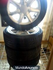 Vendo o cambio ruedas completas seminuevas economicas  de serie 185/60R14 82H FIRESTONE