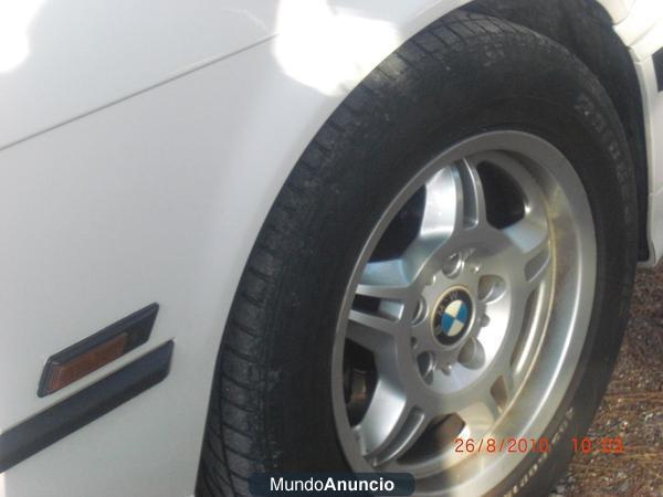 se vende bmw 318i de 113 cv color blanco con molduras negras