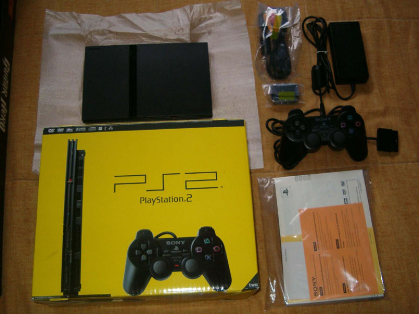 Vendo o cambio playstation 2 slim la mas fina en su caja original!