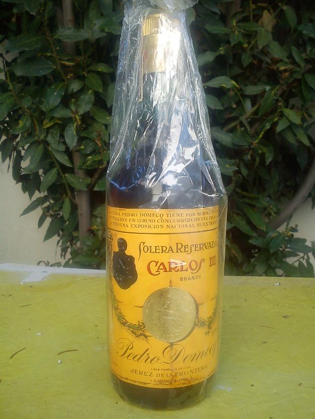 Brandy Pedro Domecq Carlos III Solera Reservada con sello de 4 pesetas