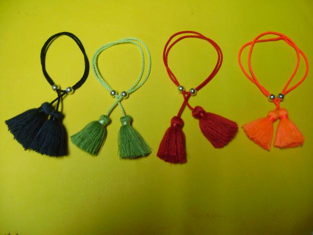 Pulseras de paulina Borlas . Somos Fabricantes