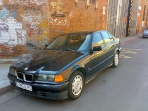 bmw 318i año 96 4pts en muy buen estado  1800 todos los extras