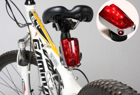 luz LED con laser para bicicleta