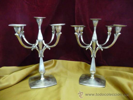 Pareja candelabros de alpaca, 5 luces