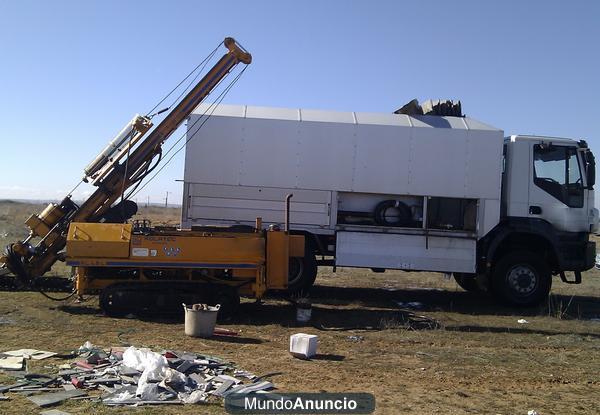 MAQUINA SONDEOS Y VEHICULO DE TRANSPORTE