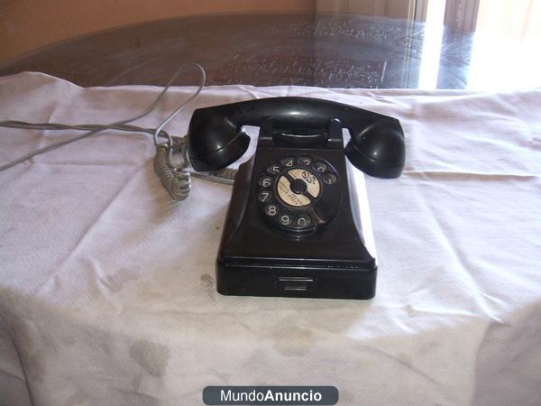 vendo telefono negro de disco,  antiguo