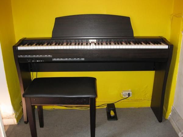 Vendo Piano Kawai CL25 700