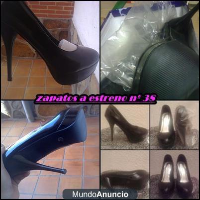 vendo zapatos negros  a  estreno