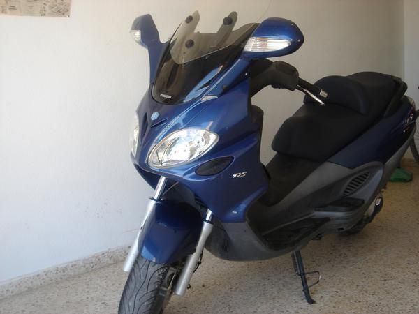 VENDO MOTO PIAGGIO X9 EVOLUCION 125 CC.