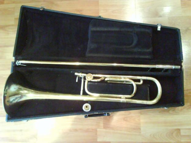 Trombón Conn americano en Sib con transpositor en Fa.