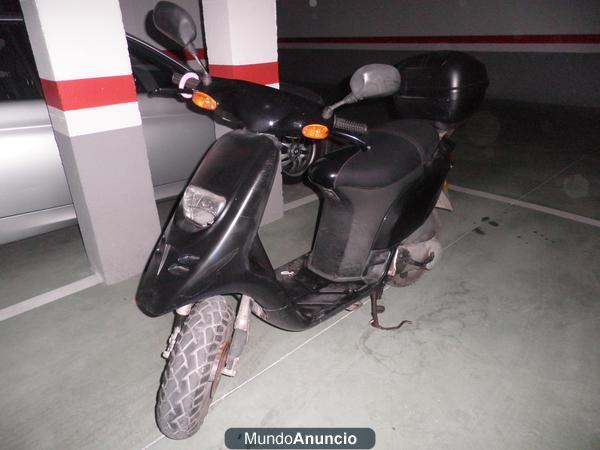 VENDO MOTO TYFHOON NEGRA Y BICICLETA MBX NARANJA