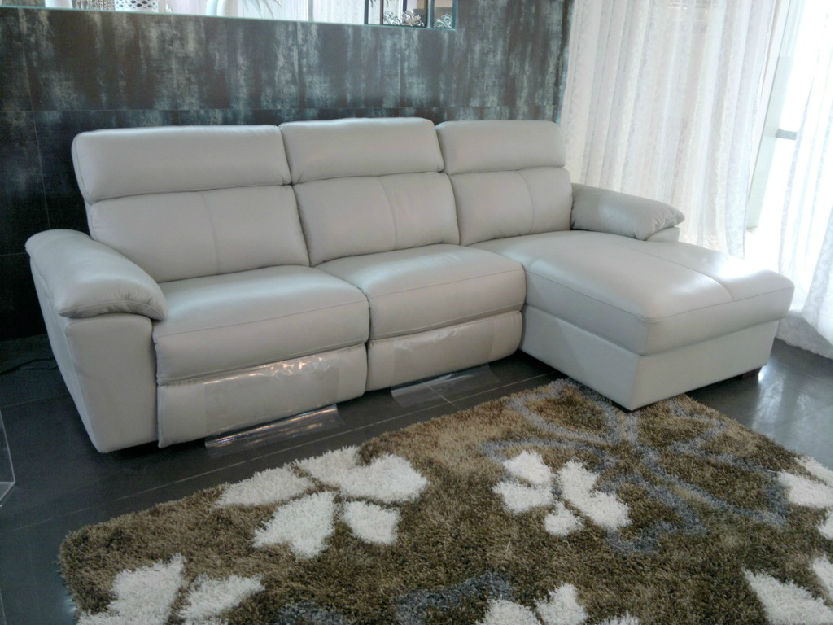 Sofa chaiselonge en piel