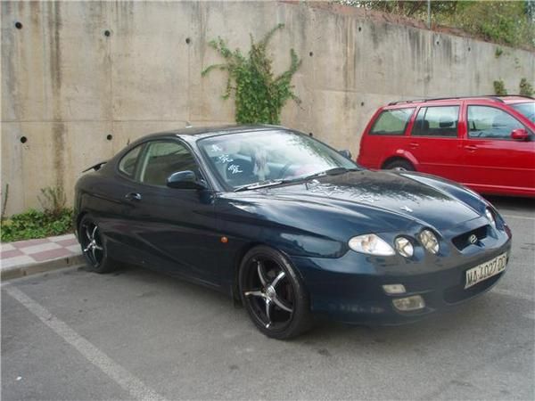 vendo precioso hyundai coupe modelo bifaro rosa y blanco