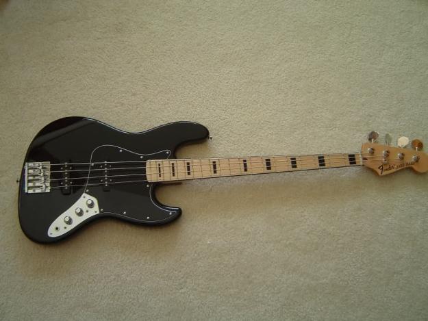 Vendo bajo Fender Jazz Geddy Lee negro o cambio por guitarra española electrificada