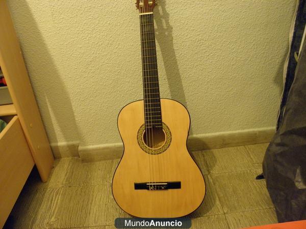 Guitarra semi-nueva española/clasicao cambio por eléctrica