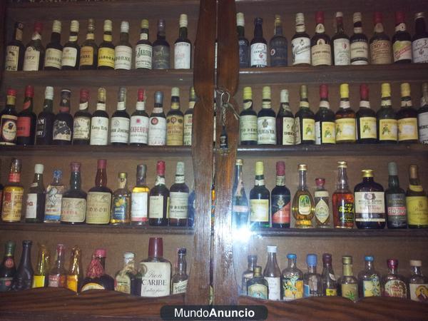 se vende coleccion de botellas antiguas