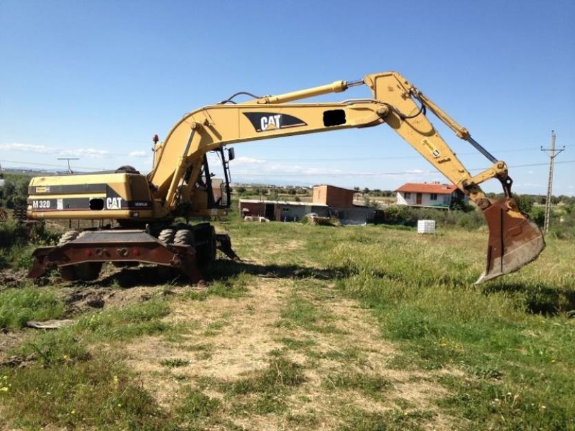 Caterpillar M320 Excavadora de Ruedas