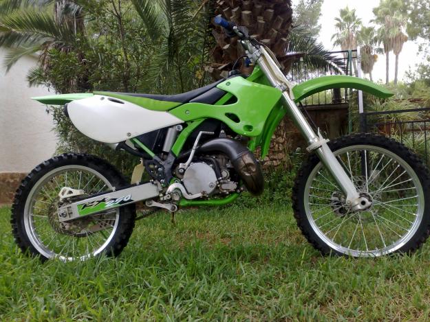 vendo kawasaki kx 250cc de 2002`+ remolque por 2800 euros