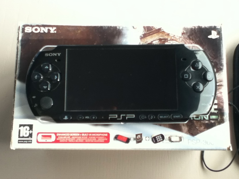 Psp slim en perfecto estado +4 juegos +1 película