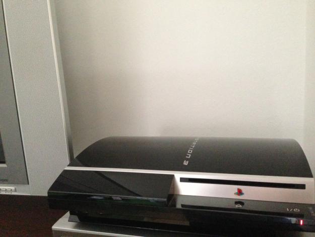 PS3 + 2 mandos + 13 juegos