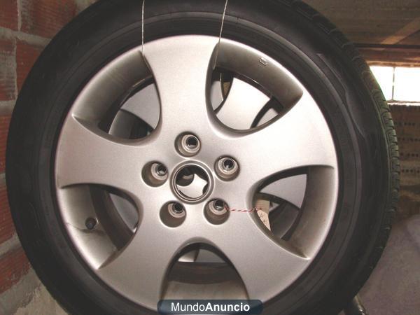 4 ruedas con llantas  de aleacion Nissan Primera P12