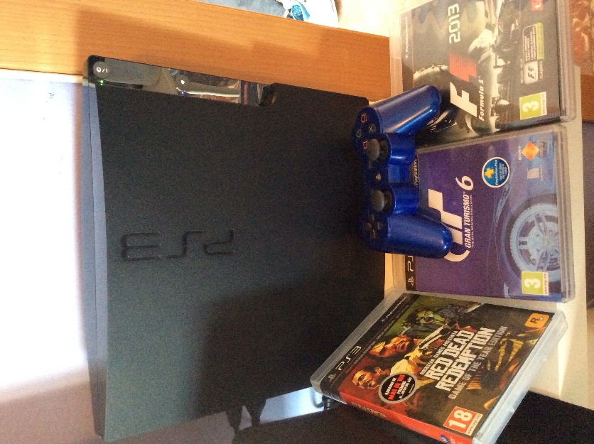 Playstation 3 320gb + gt6 + red dead goty +F1 2013+ mando azul