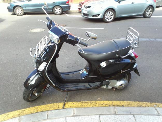 se vende vespa 125