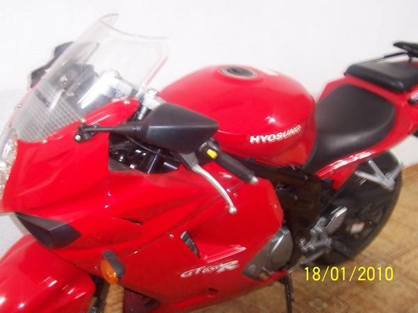 cambio moto hyosung comet gt650r roja