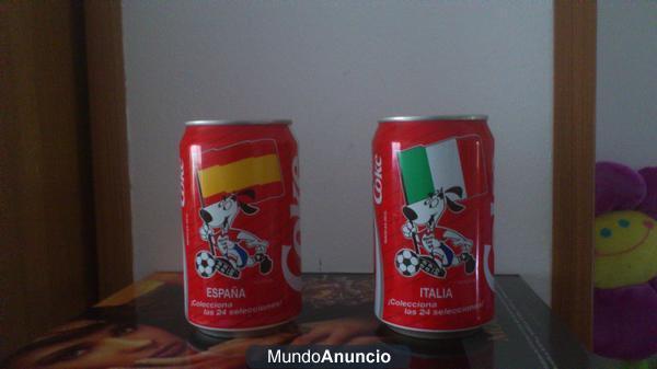 latas de coca cola con escudos de España e Italia,Estan cerradas.