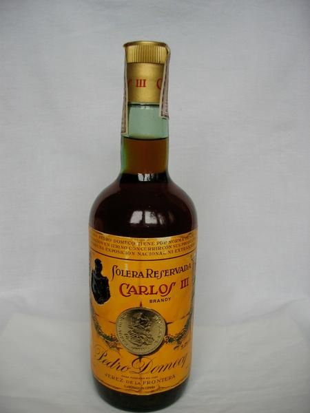 BRANDY CARLOS III SOLERA RESERVADA. SELLO 4 PESETAS