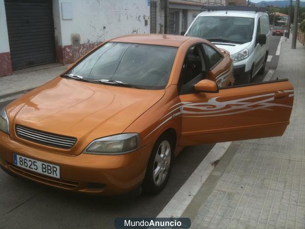 cambio opel astra bertone edition  por lancha o barco