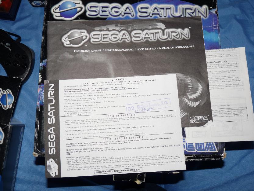 Sega Saturn + Juegos + Cableado + 3 mandos + Instrucciones + Caja y garantías originales.
