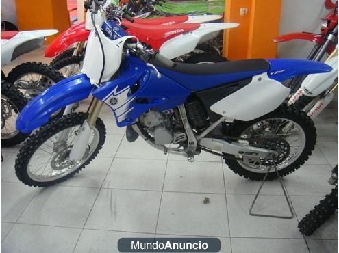 YZ 125 (Describe el estado de la moto particularidades...