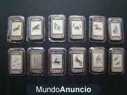 DOCE LINGOTES DE PLATA 999 DE 1 ONZA CADA UNA CON LOS SIGNOS DEL ZODIACO.