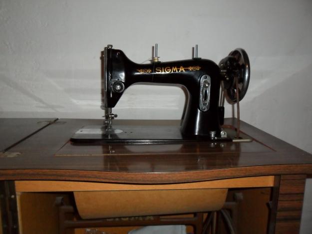 vendo maquina de coser sigma años 60 por 200 E