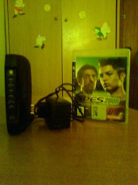 vendo moden + juego ps3 pes 2008