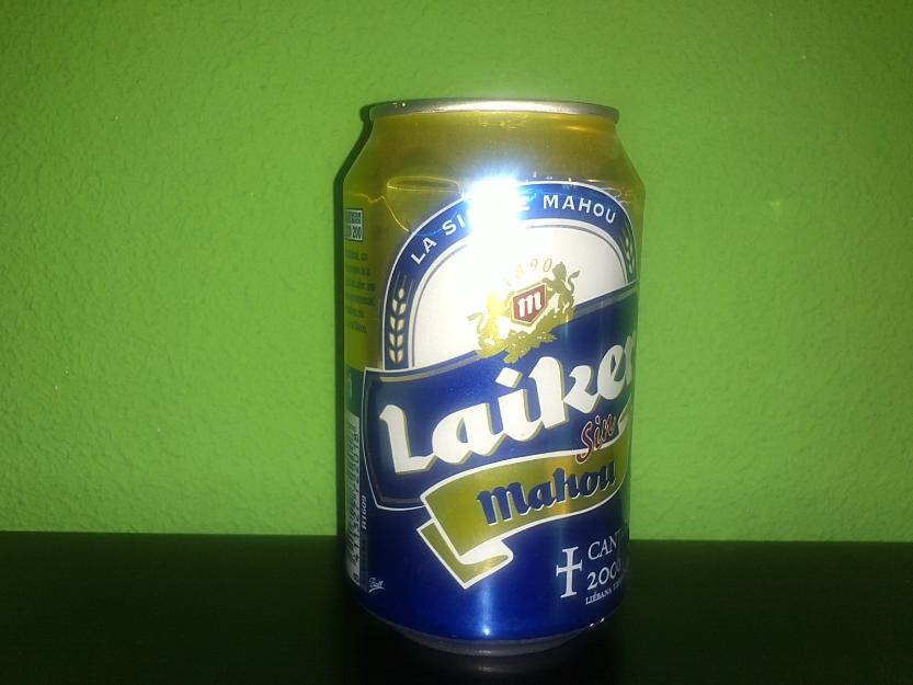 Lata de cerveza sin abrir y vacía