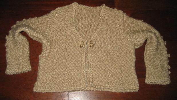 Chaqueta artesanal beige con bodoques