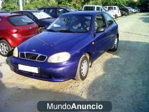 vendo daewo lanos 1.60 gasolina 3 puertas violeta