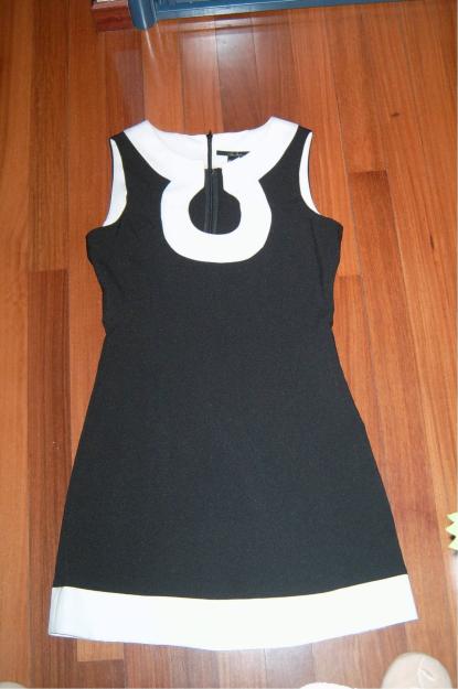 Se vende elegante vestido estilo años 60 de ZARA. Está nuevo  y es de la talla 40. Es un v