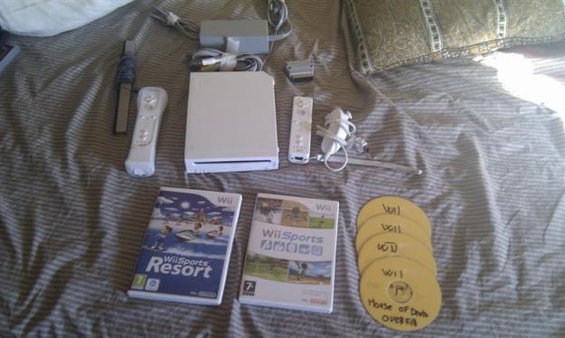 NINTENDO WII + 2 MANDOS+ WII MOTION + 2 JUEGOS+ LO LEE TODO!!