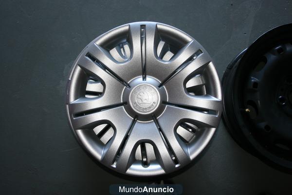 Se venden llantas con tapacubos para Skoda Fabia