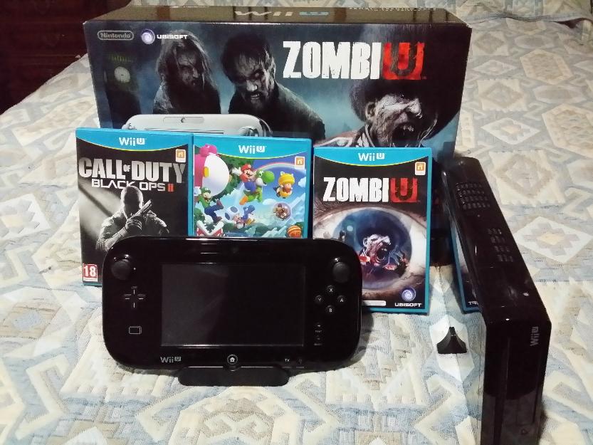 Se vende wii u 32 gb zombi u pack con juegos