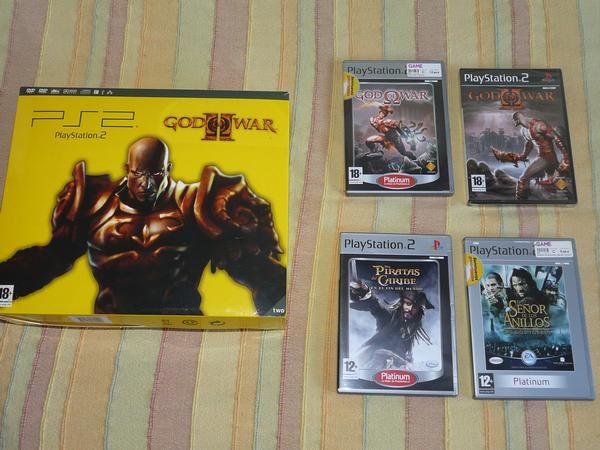 Vendo PS2 + 4 juegos. 90