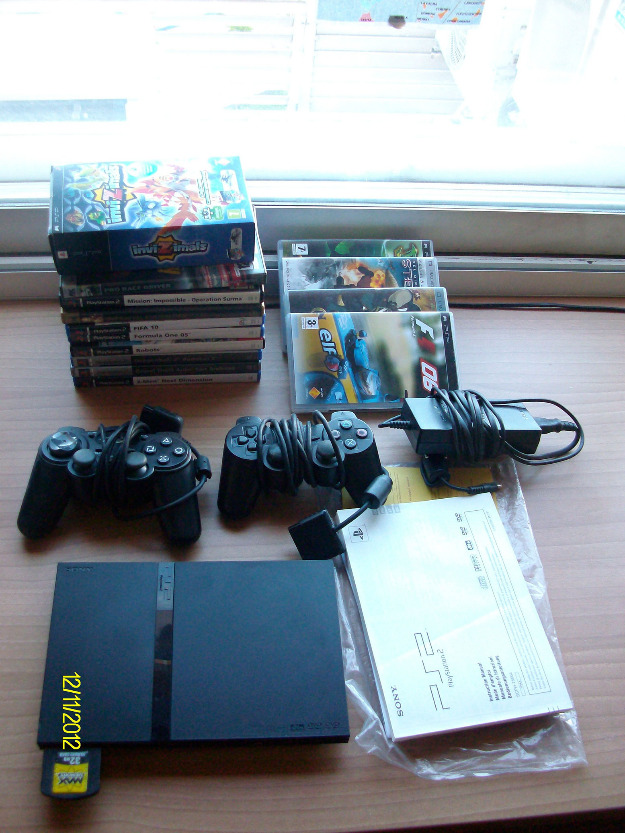 Playstation2 + accesorios + juegos + extras