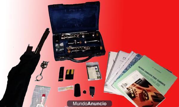 vendo clarinete con varios accesorios incluidos